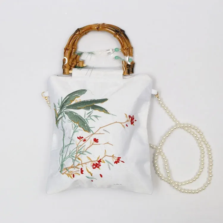 Apa sing kudu dakdoati nalika nggunakake tas tangan satin antik